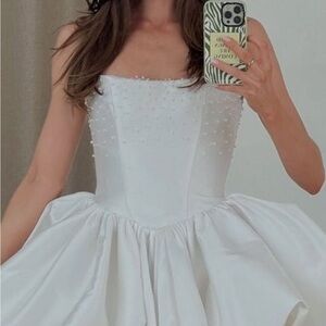 Strapless White Ball Gown Wedding Dress with Pearl Embellishments